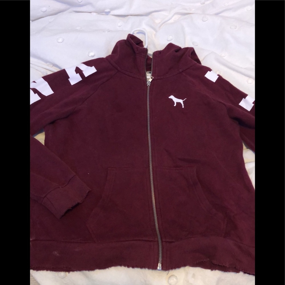 Pink brand zip up hoodie.